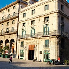 The atrium bar and restaurant inside the Hotel Marqués San Felipe is a quiet place to escape the noisy streets of Old Havana for a drink.